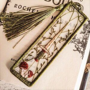 The buried and the bound hedge witch embroidery bookmark lit